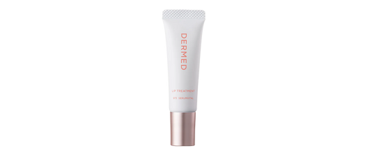 White tube of DERMed Lip Treatment with a silver and rose gold cap.